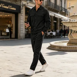 Men's black corduroy two-piece leisure set with a multi-pocket workwear jacket and pants