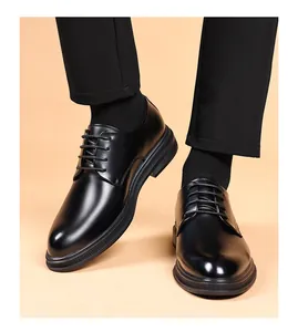 Close-up of classic black men's leather derby shoes for formal business occasions.