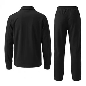 Back view of men's black corduroy two-piece set with ribbed texture jacket and pants