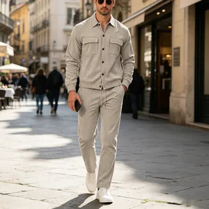 Men's two-piece light gray corduroy casual suit shown in a stylish street setting