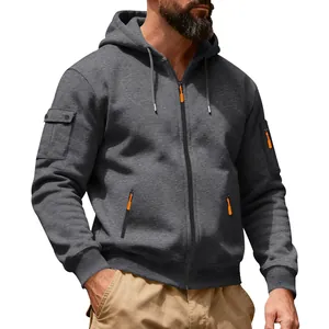 Detailopname van donkergrijze zware fleece hoodie met ritssluiting en oranje accenten.
