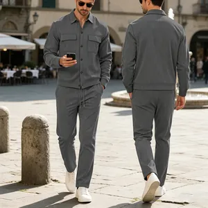 Detailed front and back view of men's gray corduroy casual set in an urban setting.