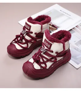 Warm children's snow boots featuring thick burgundy fleece lining and distinctive KIDS label