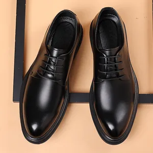Professional black leather dress shoes for men in a classic British business and office style.