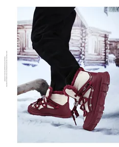 Close-up of kids' waterproof fleece-lined snow boots shown in a winter outdoor setting.