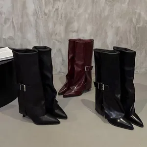 Chic pointed toe pant leg boots with belt buckle and kitten heel in black and red