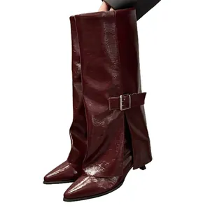 Elegant burgundy pant-leg tall boots with stiletto heel and metallic buckle detail