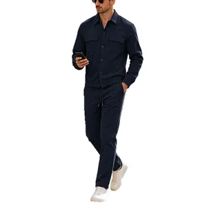 Men's stylish navy blue corduroy two-piece casual outfit featuring multi-pocket jacket and pants