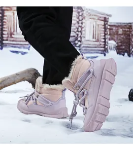 Detailed view of lavender children's snow boots with warm faux fur lining in a snow scene