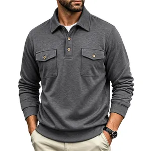 Detailed view of grey heavyweight long sleeve polo shirt with double chest pockets