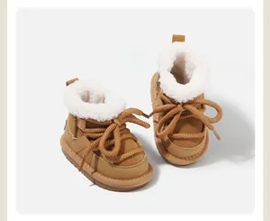 Detailed view of children's tan snow boots with warm fleece lining and thick rope laces