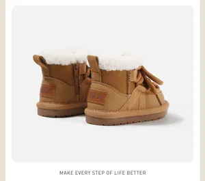 Detail showing warm white faux fur lining and thick woven laces on camel snow boots