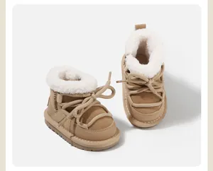 Cozy children's tan snow boots featuring thick rope laces and soft white faux fur lining