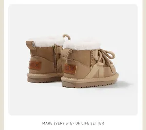 Detailed rear view of khaki children's snow boots with soft white faux fur lining