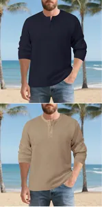 Detail view showing textured waffle fabric on men's navy and khaki long sleeve Henley shirts