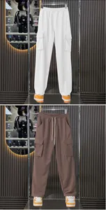Heavyweight high-street cargo sweatpants for men featuring multiple pockets in white and brown