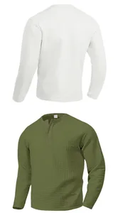 Detailed view of men's waffle knit long sleeve Henley shirts in white and olive green