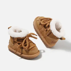 Cozy brown winter snow boots for kids featuring thick rope laces and faux fur lining