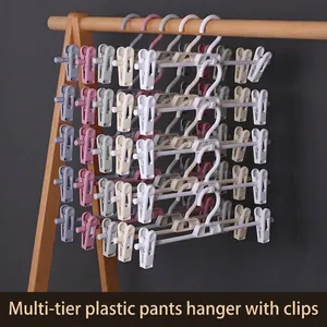 Perchas para Pantalones de Plástico Multifuncionales Japonesas Con Clips Retráctiles Ahorro de Espacio Apilables Organizador de Armario
