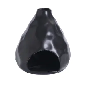 Quemador creativo de cerámica negro mate para salvia y palo santo, textura piedra