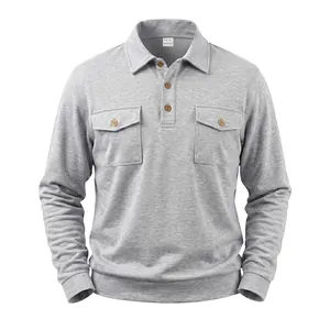Detailed front view of a grey heavy long sleeve polo with double chest pockets.