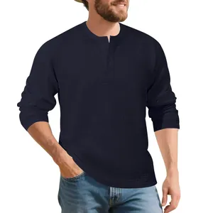 Men's heavy long sleeve Henley shirt with textured waffle knit fabric in navy blue.