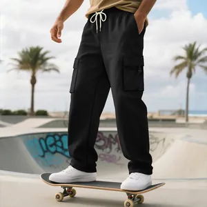 Men's heavyweight hip hop streetwear loose cargo sweatpants in black on a skateboard