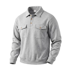Detail of grey heavyweight long sleeve polo shirt with double chest pockets and buttons