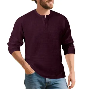 Men's heavy weight waffle knit long sleeve Henley shirt featuring vintage jacquard texture.