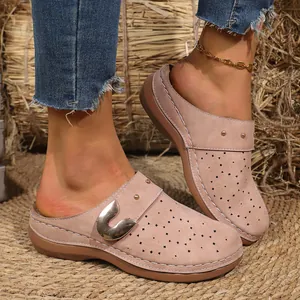 Retro thick-bottomed clogs for women with floral hollow design and suede finish