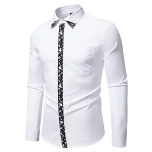 Close-up of white men's shirt with paisley print trim on collar and placket