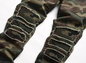 Close-up detail of camouflage biker jeans with ribbed panels and distressed edges