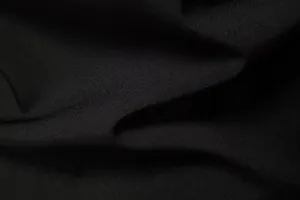 Macro detail of black fabric texture for men's fashion leisure long-sleeved shirt