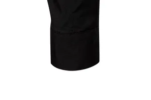 Close-up detail of the black sleeve cuff of a men's fashion casual long-sleeved shirt
