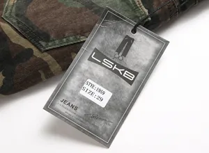 Close-up of hangtag on men's camouflage jeans showing size 29 and LSKB brand logo