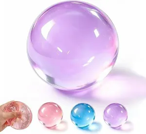 Translucent squishy stress relief balls in various bright colors like purple and blue
