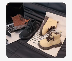 Detail view of retro British style children's Martin boots with side zippers and soft soles.