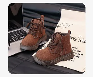 Detailed view of brown retro kids Martin boots with side zipper and warm lining