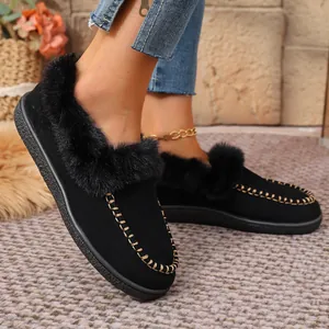 Elegant black faux suede fur-lined flat loafers with decorative gold chain detail