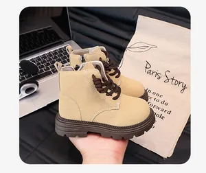 Detail of retro British style children's Martin boots with side zipper in khaki