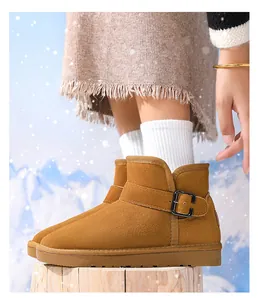 Detailed side view of mustard yellow suede winter snow boots for kids