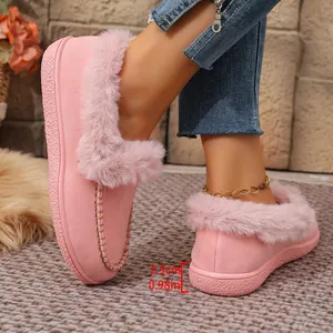Macro detail of pink suede winter slipper showing a 2.5cm or 0.98 inch heel height