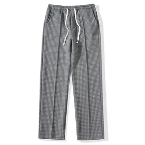 Close-up showing the grey waffle texture and elastic drawstring waist detail