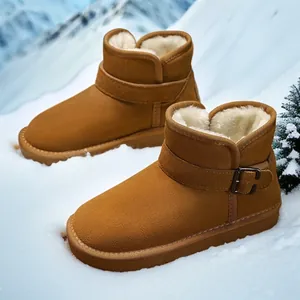 Warm brown kids' winter snow boots with plush lining and buckle in a snowy scene