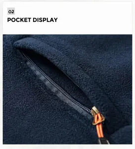 Detail showing navy blue polar fleece jacket with secure orange-pull zipper pocket