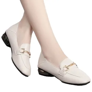 Elegant off-white square toe loafers featuring gold metal buckle and comfortable low block heel