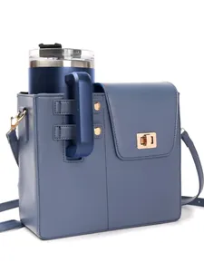 Detail of blue crossbody bag featuring unique built-in side pocket for a large tumbler