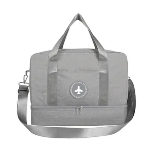 Large capacity grey travel bag with dry wet separation, hand straps and airplane logo.