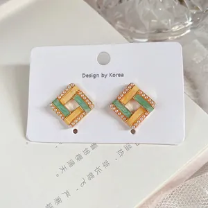 Elegant French vintage square enamel stud earrings with pearl trim and gold finish