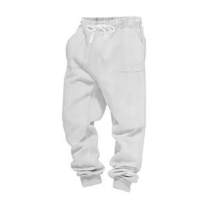 Close-up of men's heavy jacquard joggers with a textured cable knit pattern in light gray